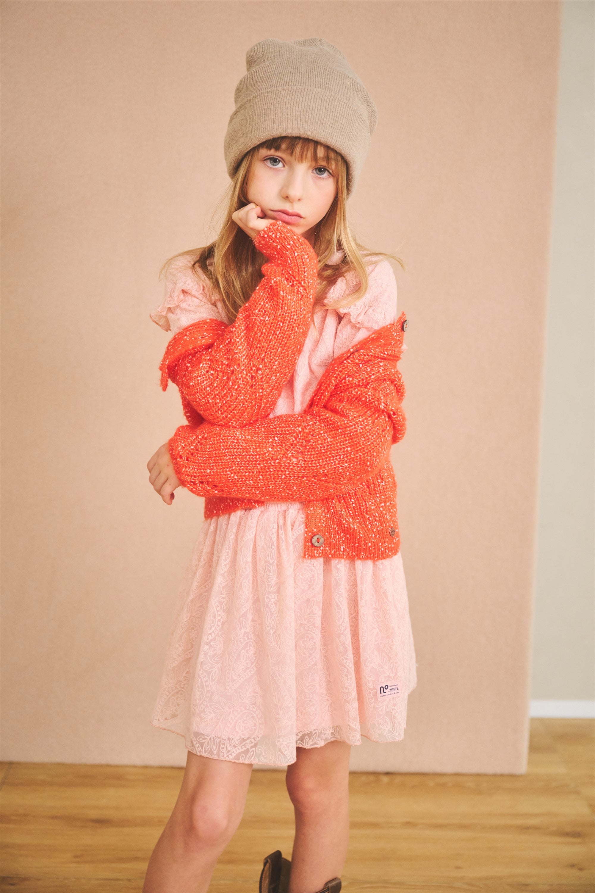 Aloha Knitted Cardigan of Red Speckled Yarn