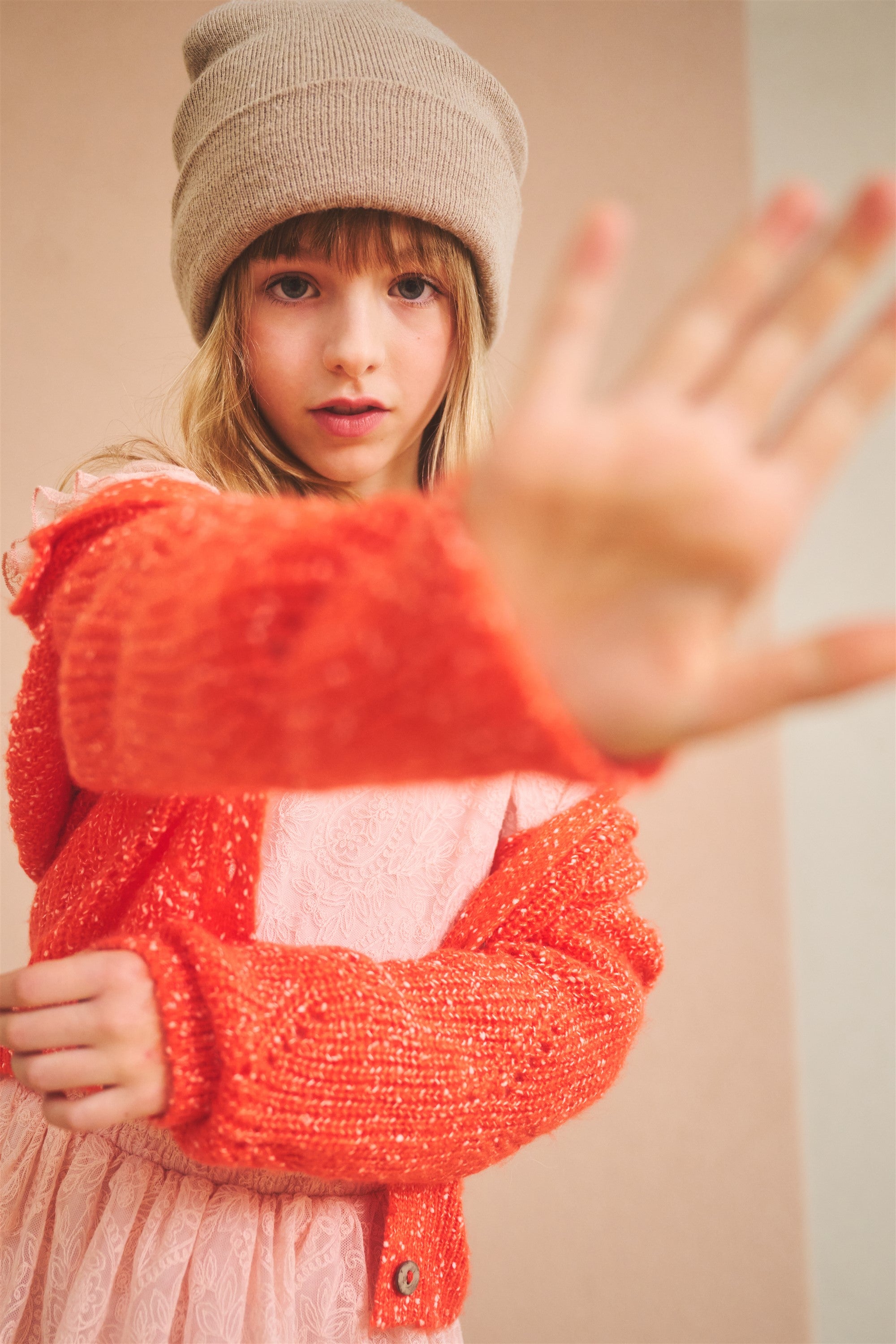 Aloha Knitted Cardigan of Red Speckled Yarn