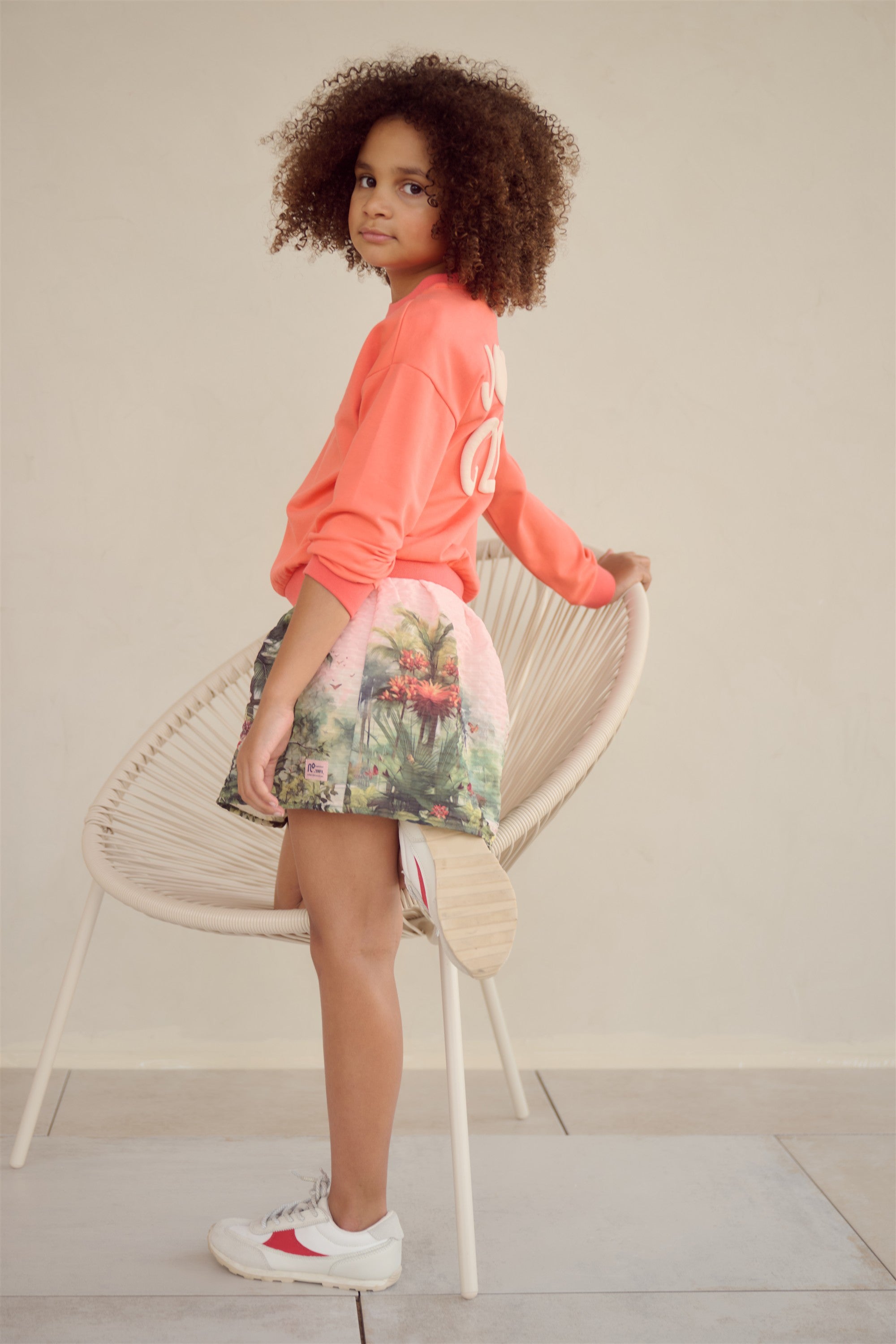 Konono Sweater 'Join the Club' rugprint Koraal Oranje